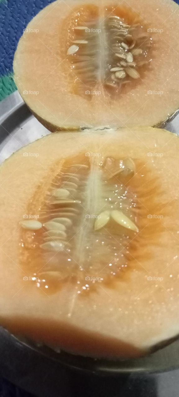 Muskmelon is melon category fruit. Muskmelon is tasty, sweet and musky smells fruits. muskmelon has high water contain. Muskmelon is summer snacks.