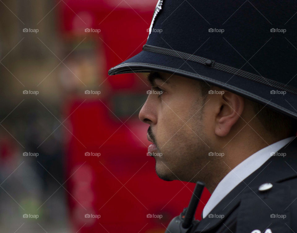 A bobby outside Westminster awaiting Lady Thatcher's hearse.