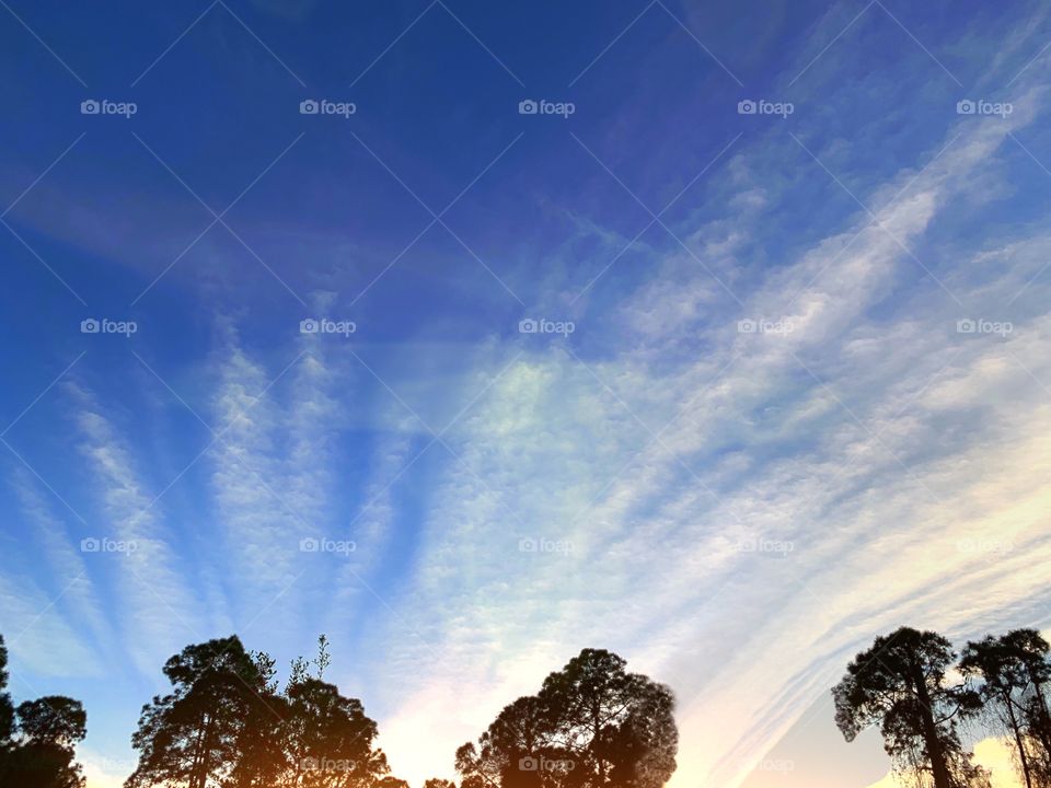 Unique and beautiful clouds and sun.