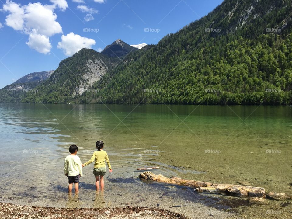 Children at the Lake on a sunny Summer day 