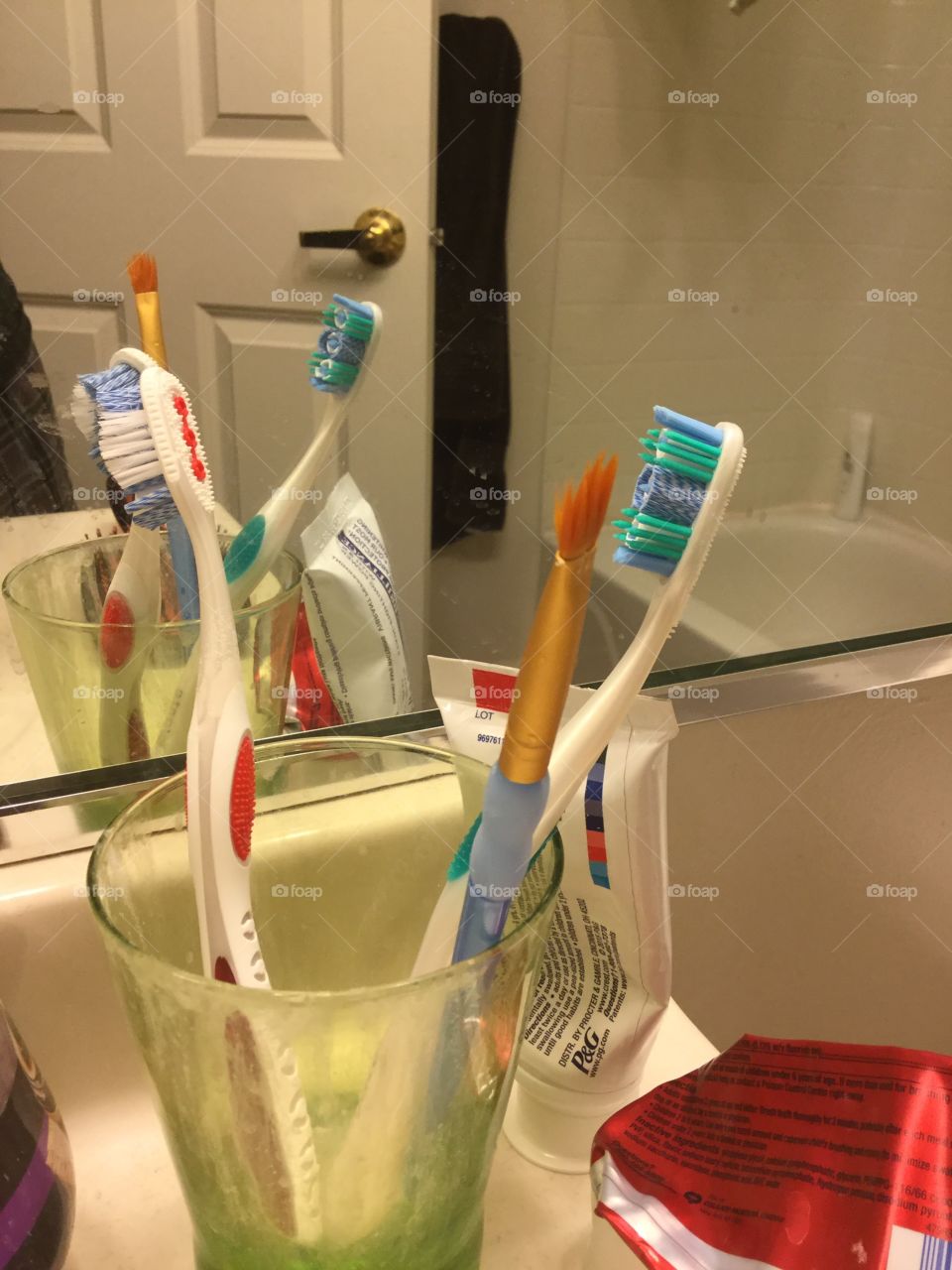 You know you live with an artist when the paint brushes hang out with the tooth brushes. 