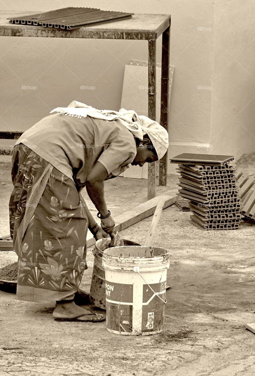 Women - Working in construction site 