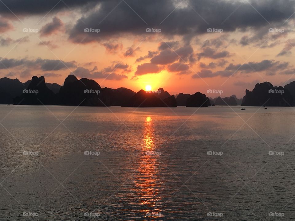 Sun set scenery at Ha Long Bay, Northeast Vietnam 