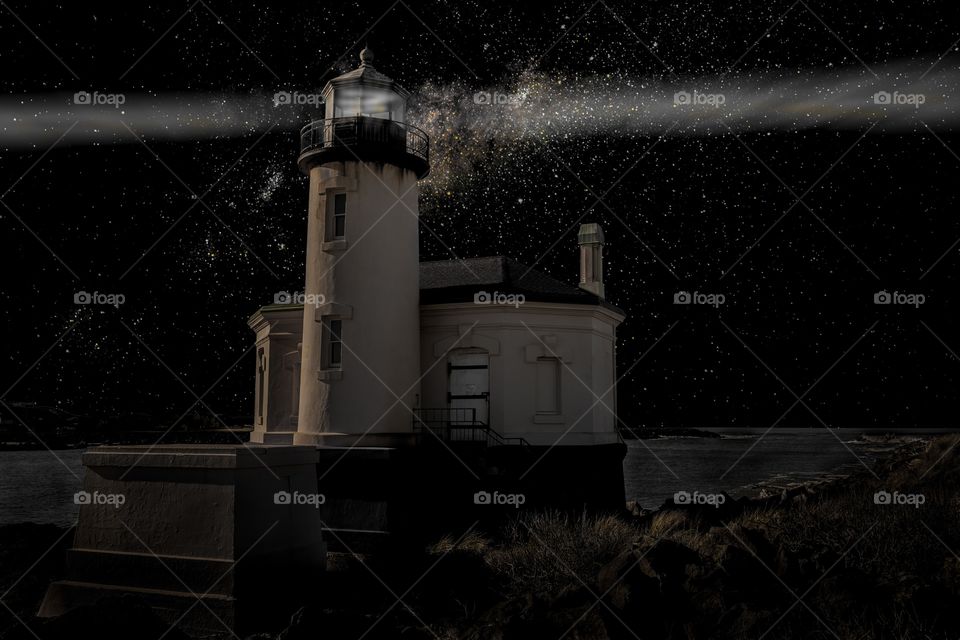 Lighthouse glowing at night