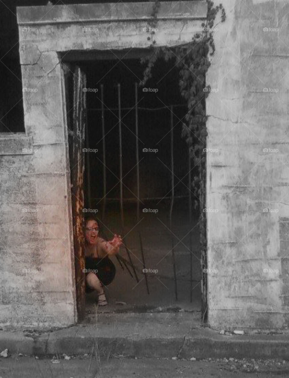 Zombified. A girlfriend and I taking pics at an abandoned
 building after the local zombie walk food drive.
