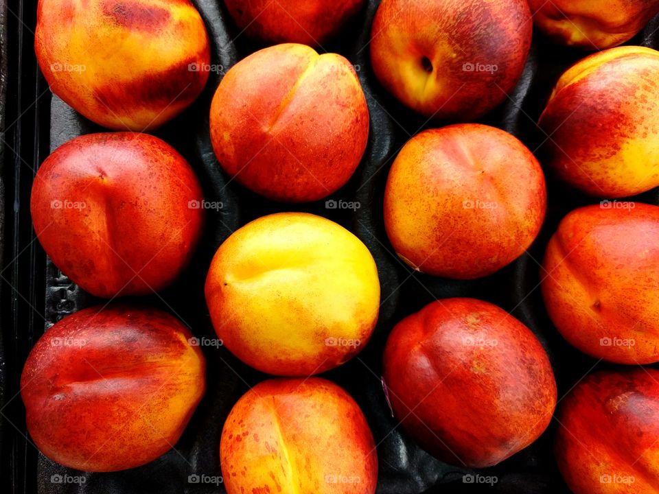 A Case of Nectarines