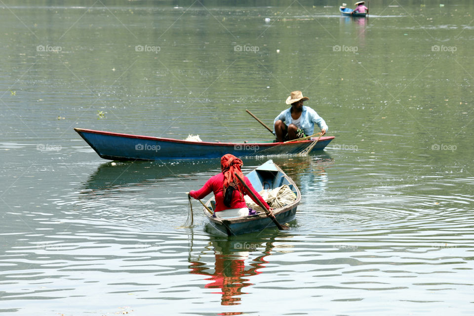 men&women fishing in Begnas lake nepal
