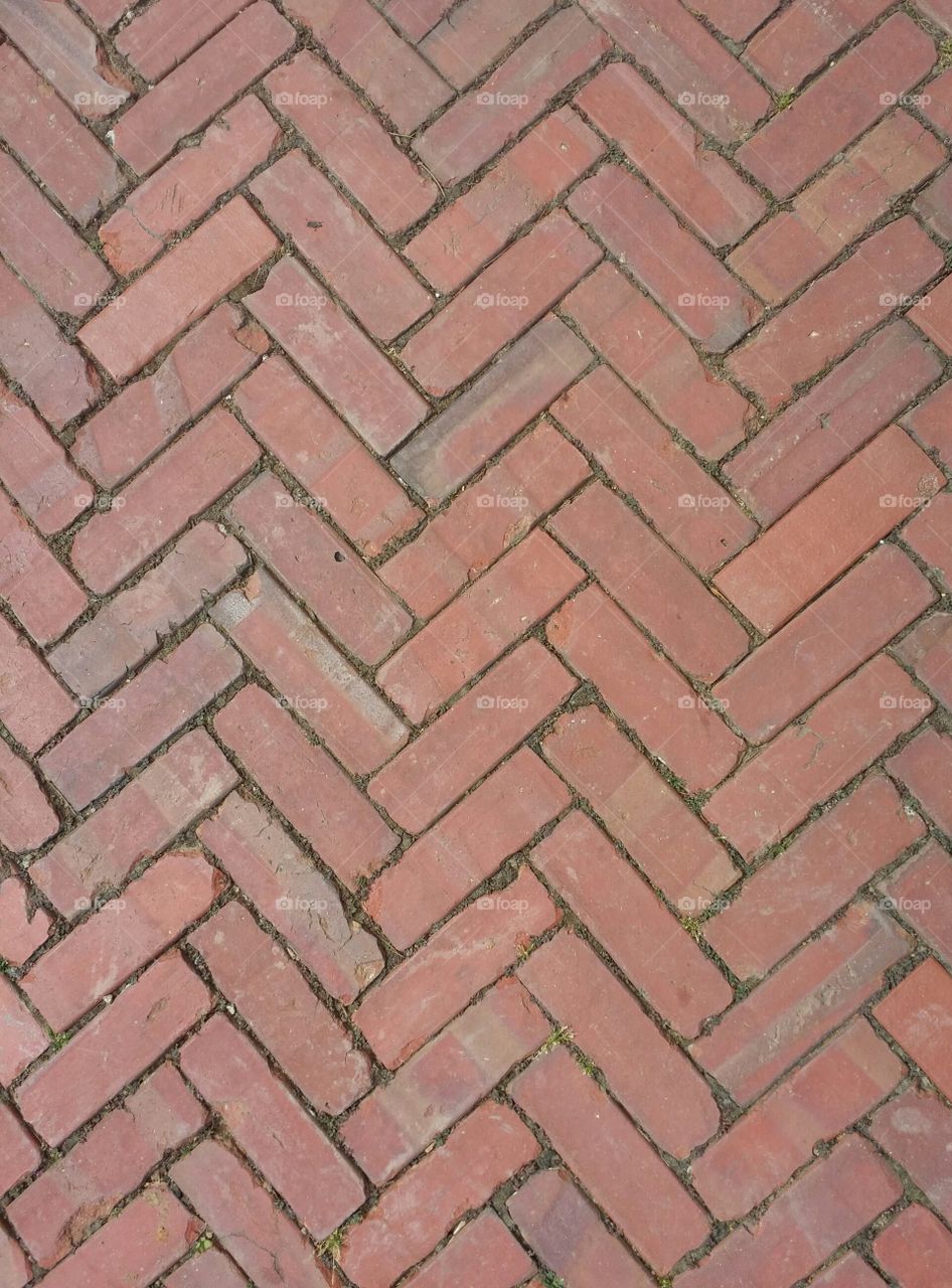 Red Brick walkway. One hundred year old Red Brick in a Herringbone pattern creates an inviting walkway in Asheville North Carolina
