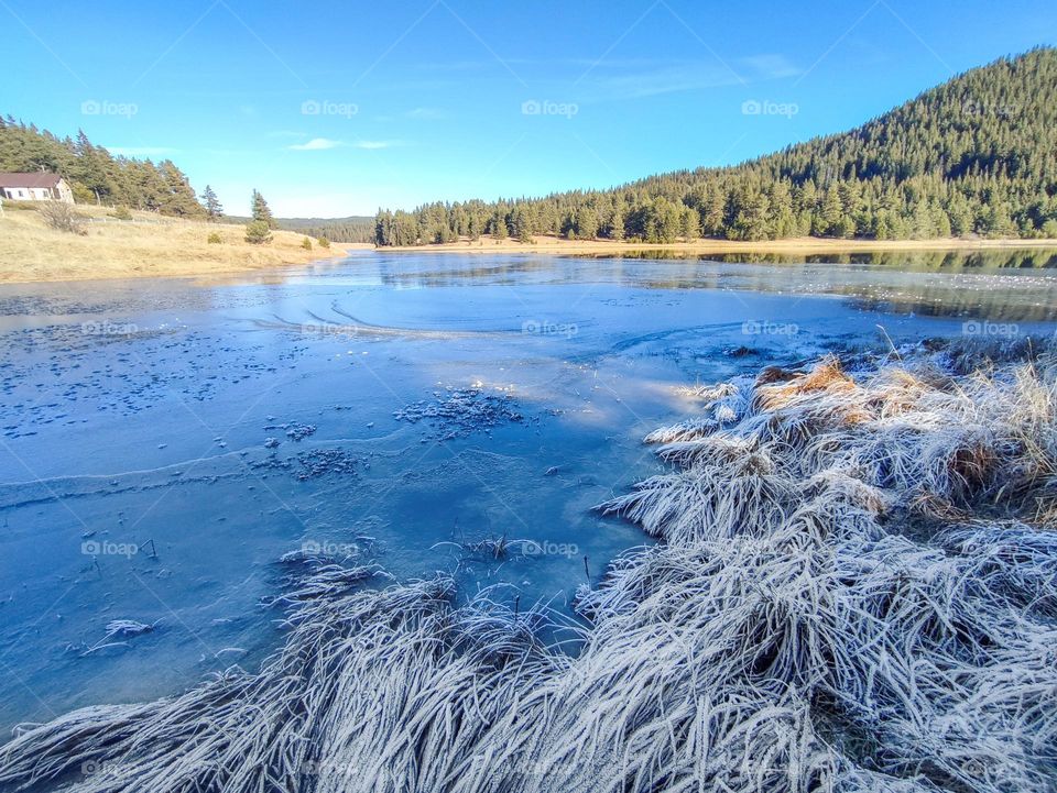 Frosty Marvels: Nature's Ice Artistry Frozen Lake