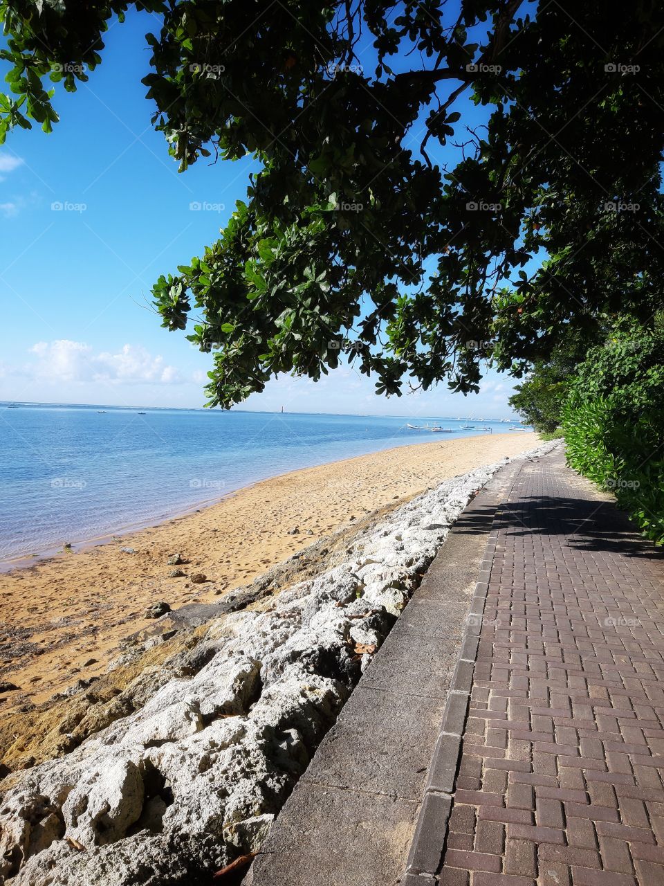 The sidewalk in the sandy beach