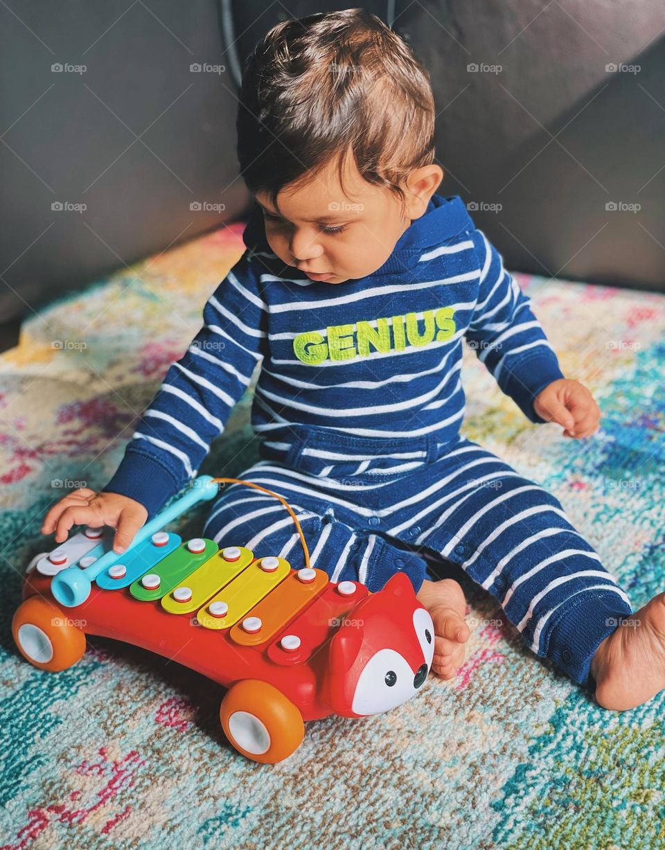 Baby plays with toy, baby playing musical toy instrument, baby plays with xylophone toy, colorful xylophone fox toy and baby