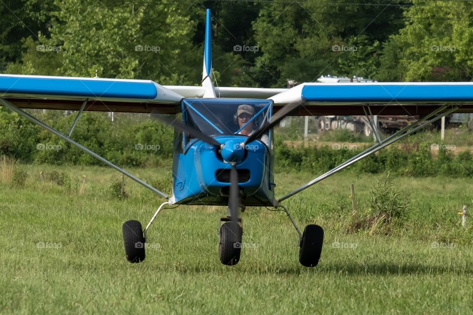 Foap, A to B: A pilot lands his two-seater airplane in a pasture. 