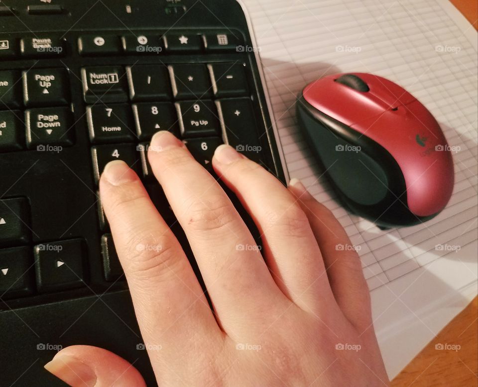 hand, mouse and keyboard