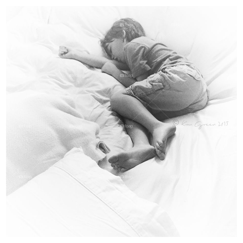 Boy Sleeping in Black and White. Young boy asleep/black and white/portrait 