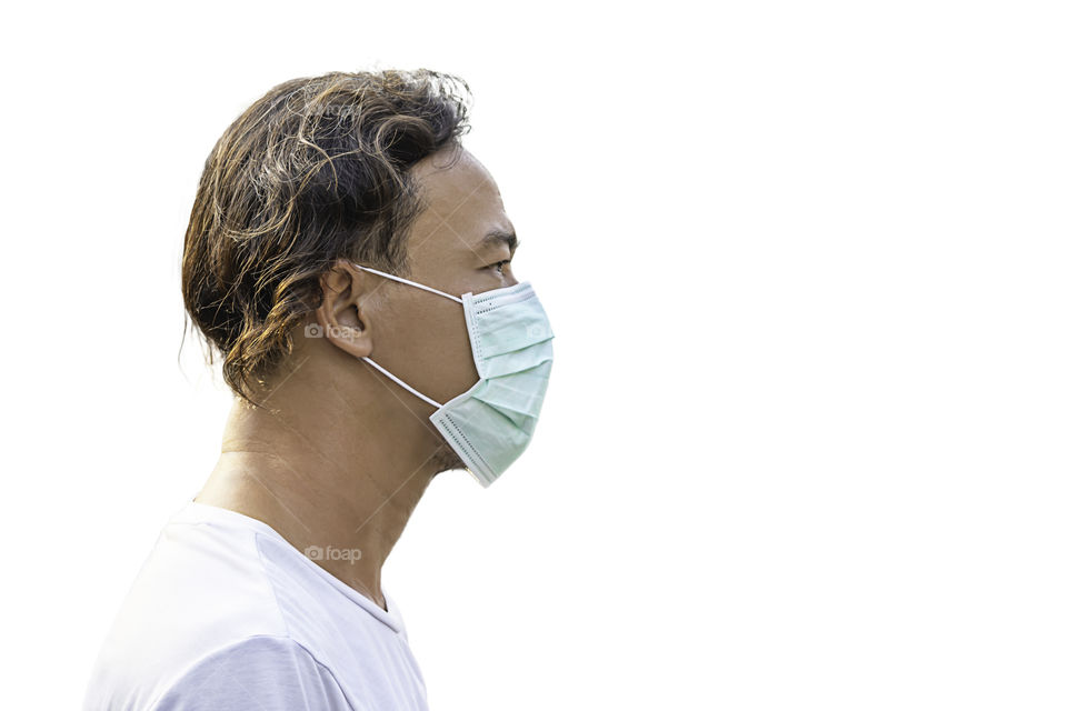 Isolated Asean Man wear a mask to prevent dust on a white background with clipping path.