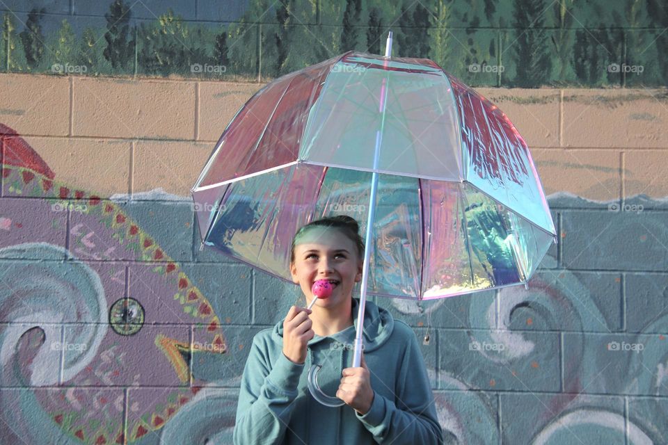 Colorful mural with girl holding umbrella 