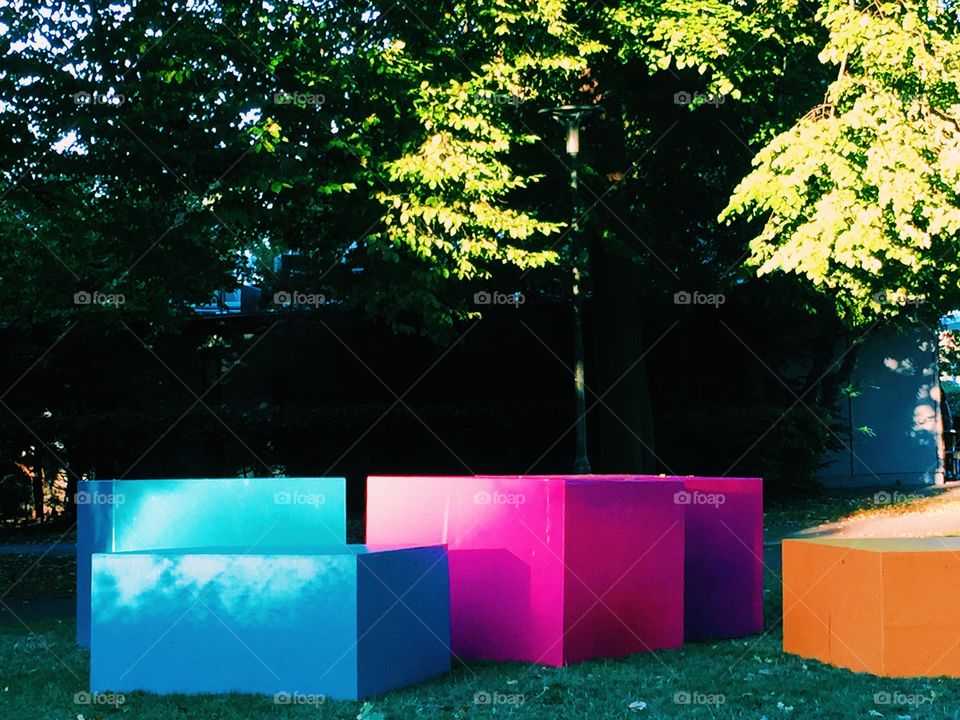 Multicolored boxes on nature