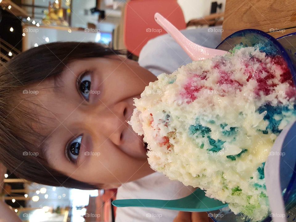 kid eating colorful bingsu Korean ice cream