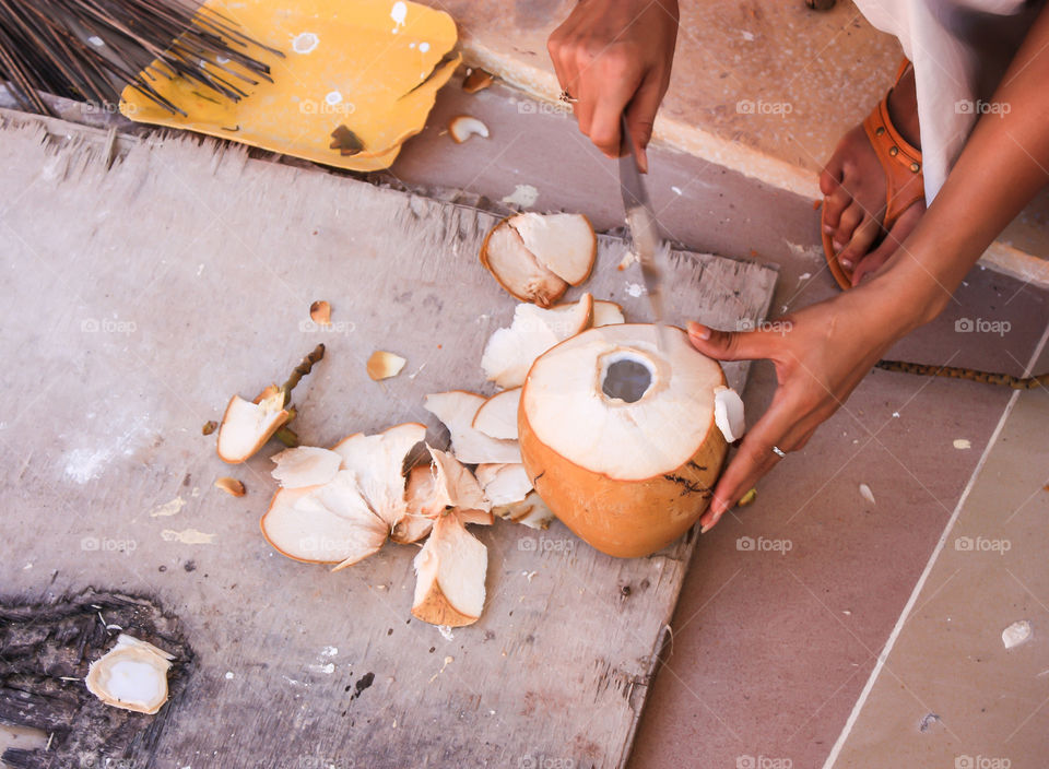 cutting a coconut