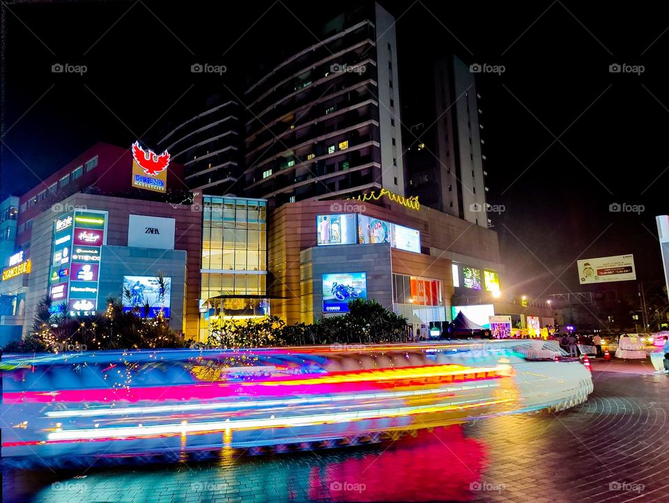 A colorfull night at phoenix market City Chennai. mobile photography with bare hand