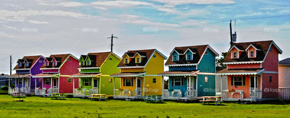 Tiny houses. Row of tiny, colorful houses in the Outer Banks of NC