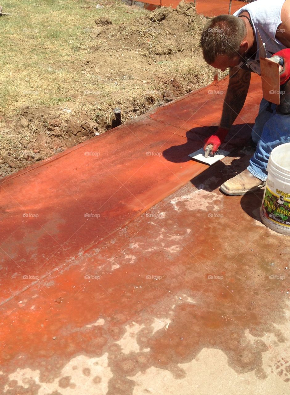 Staining the concrete a terra cotta shade