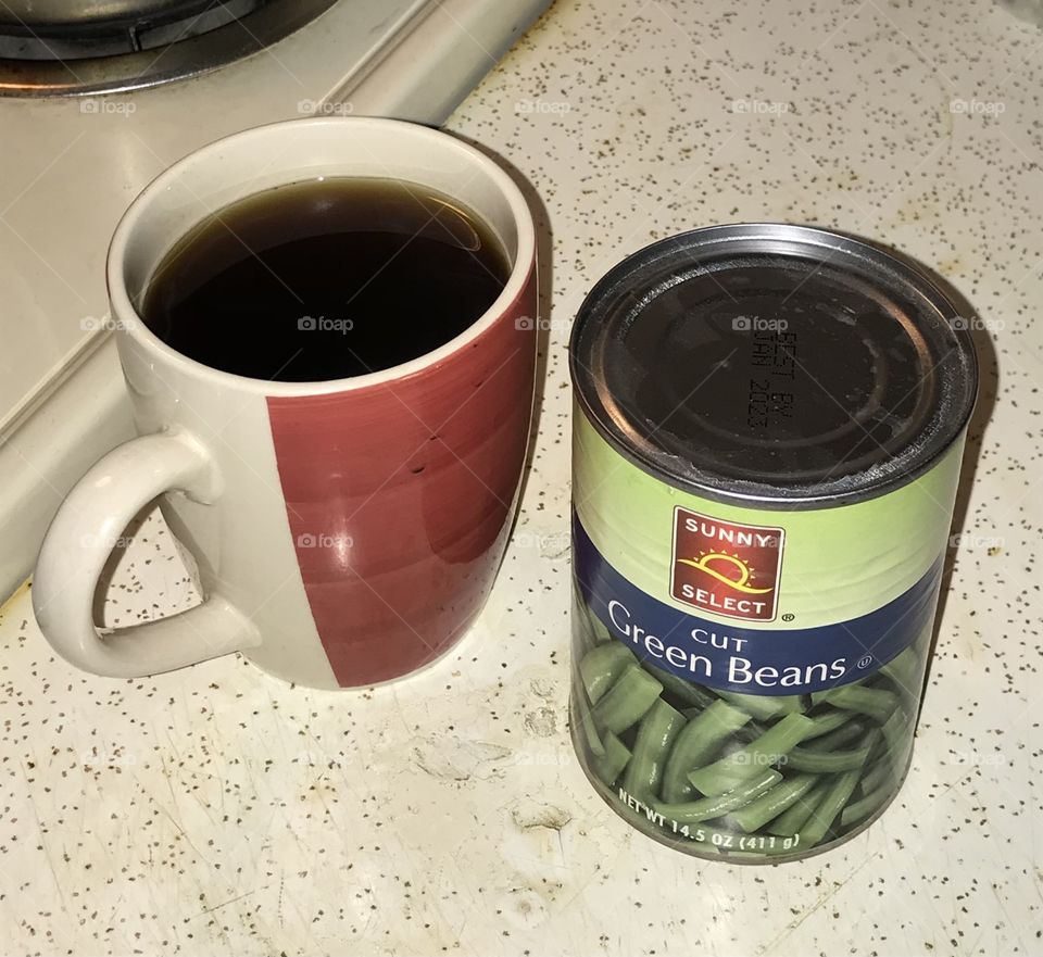 Instant black coffee and canned green beans together. It is certainly healthy consumption.