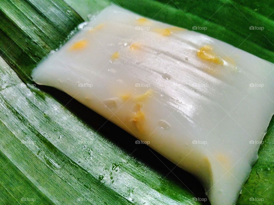 Traditional food from Indonesia made from rice flour and jackfruit wrapped in banana leaves