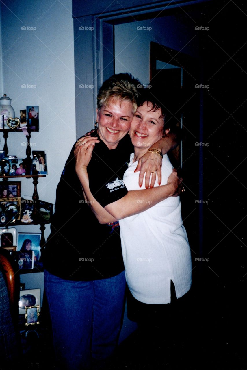 Women hugging, sisters hugging. Smiling girls hugging each other. Happiness between two women, showing love❤