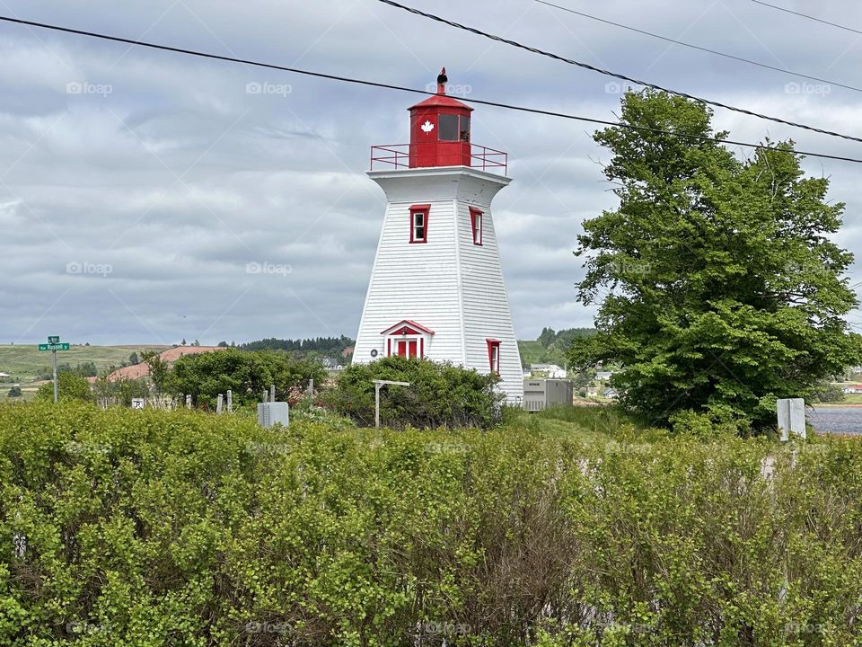 Lighthouses on the coast, Canadian coast lighthouses, looking out of lighthouses, red and white iconic lighthouse 