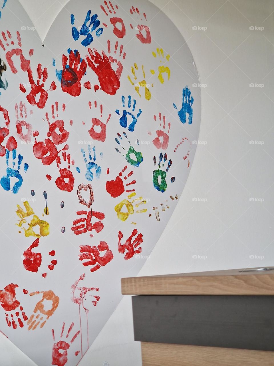 Paintings of colored palms.