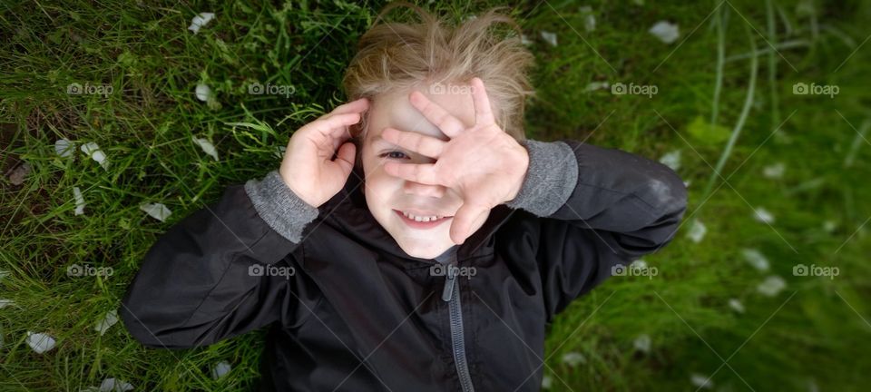 little boy on the grass