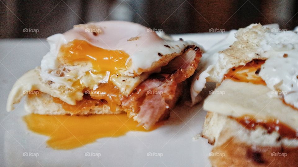 Homemade sandwich with eggs and bacon