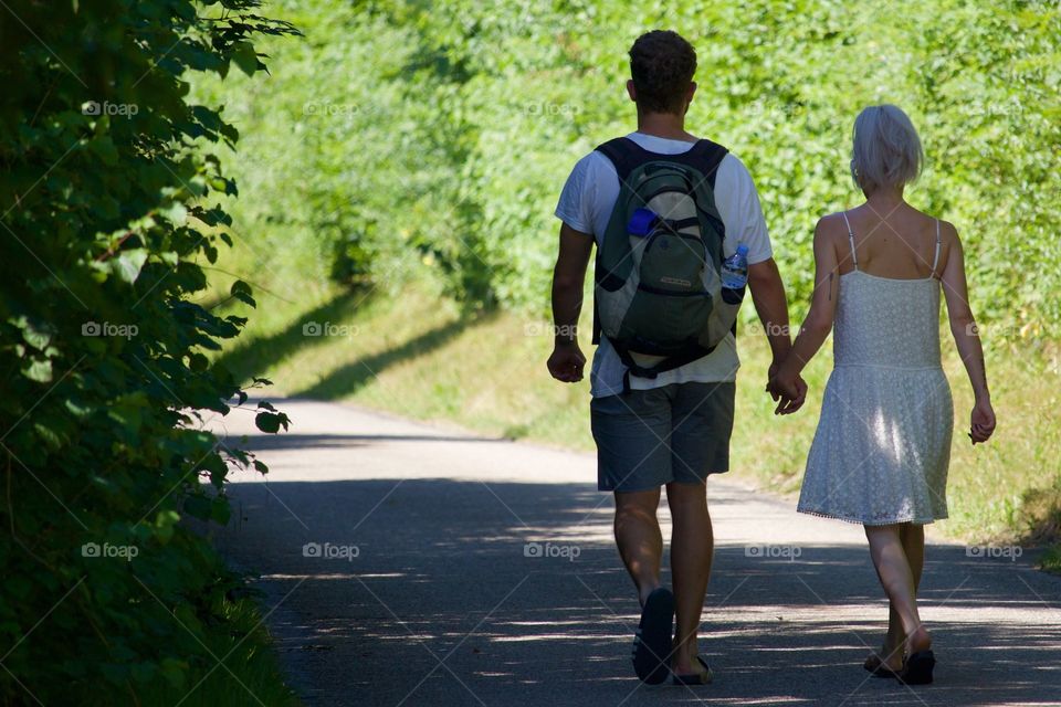 Couple Walking In The Nature