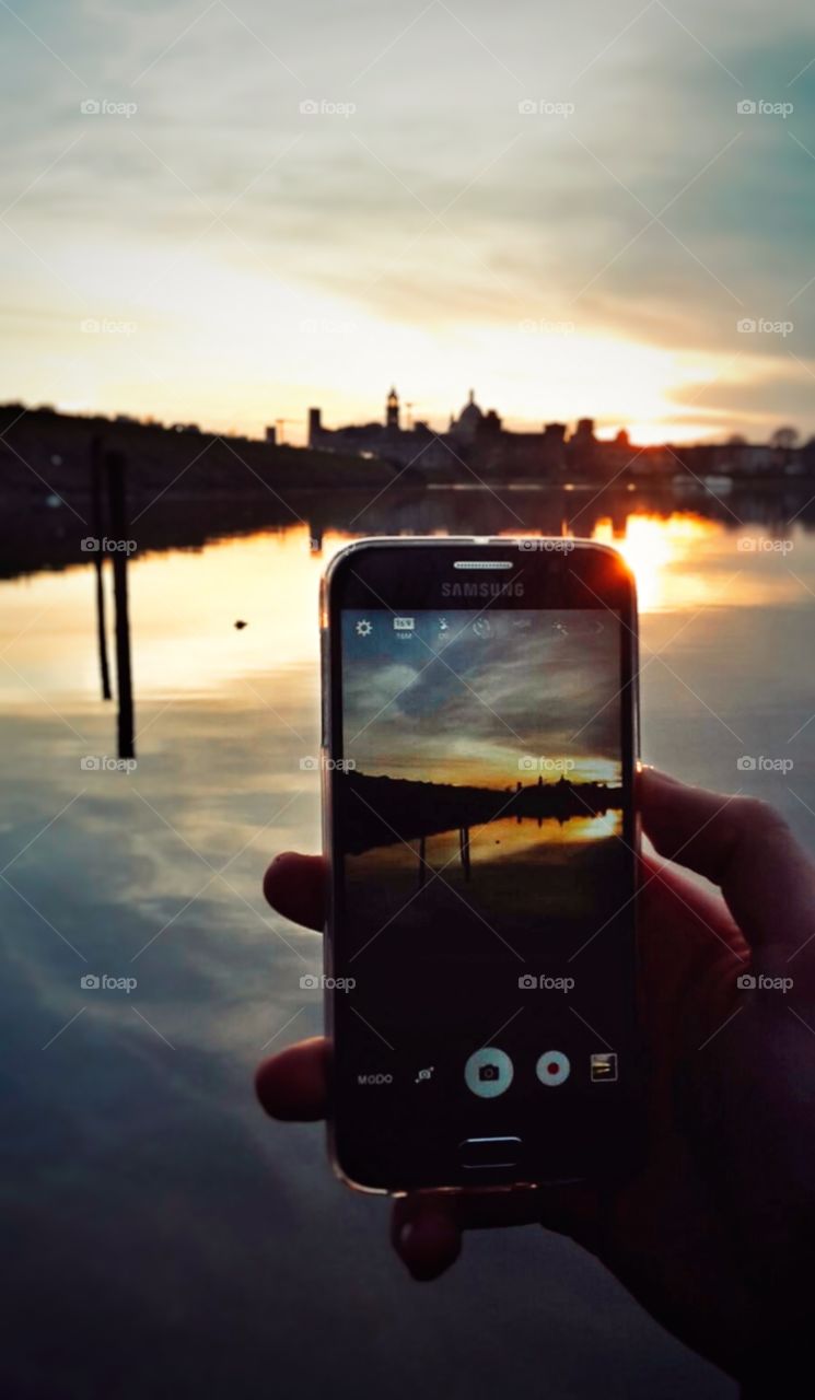 Taking photos of a sunset