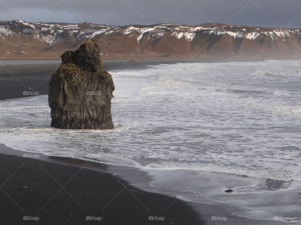 Black Sand Beach off the southern coast of Iceland