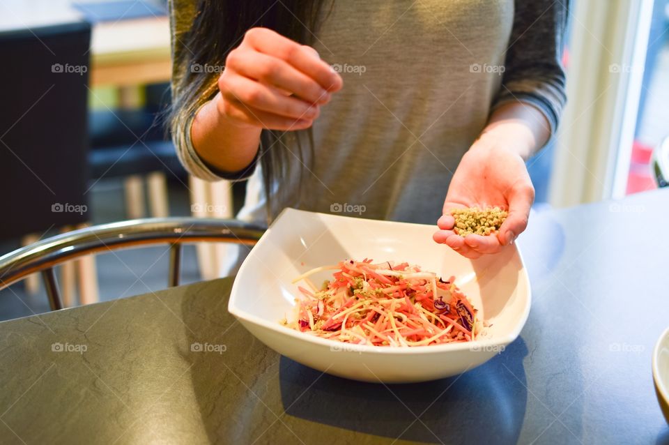 Mid section of women preparing food