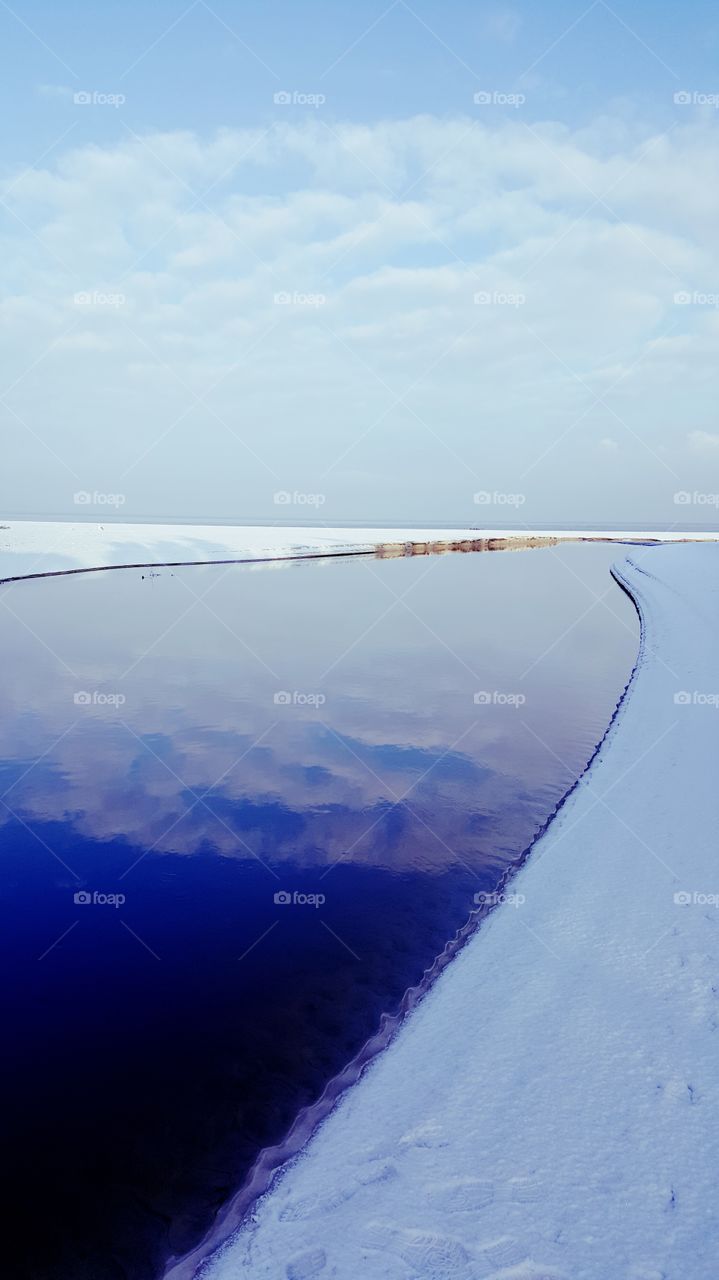 The mouth of the river to the sea.