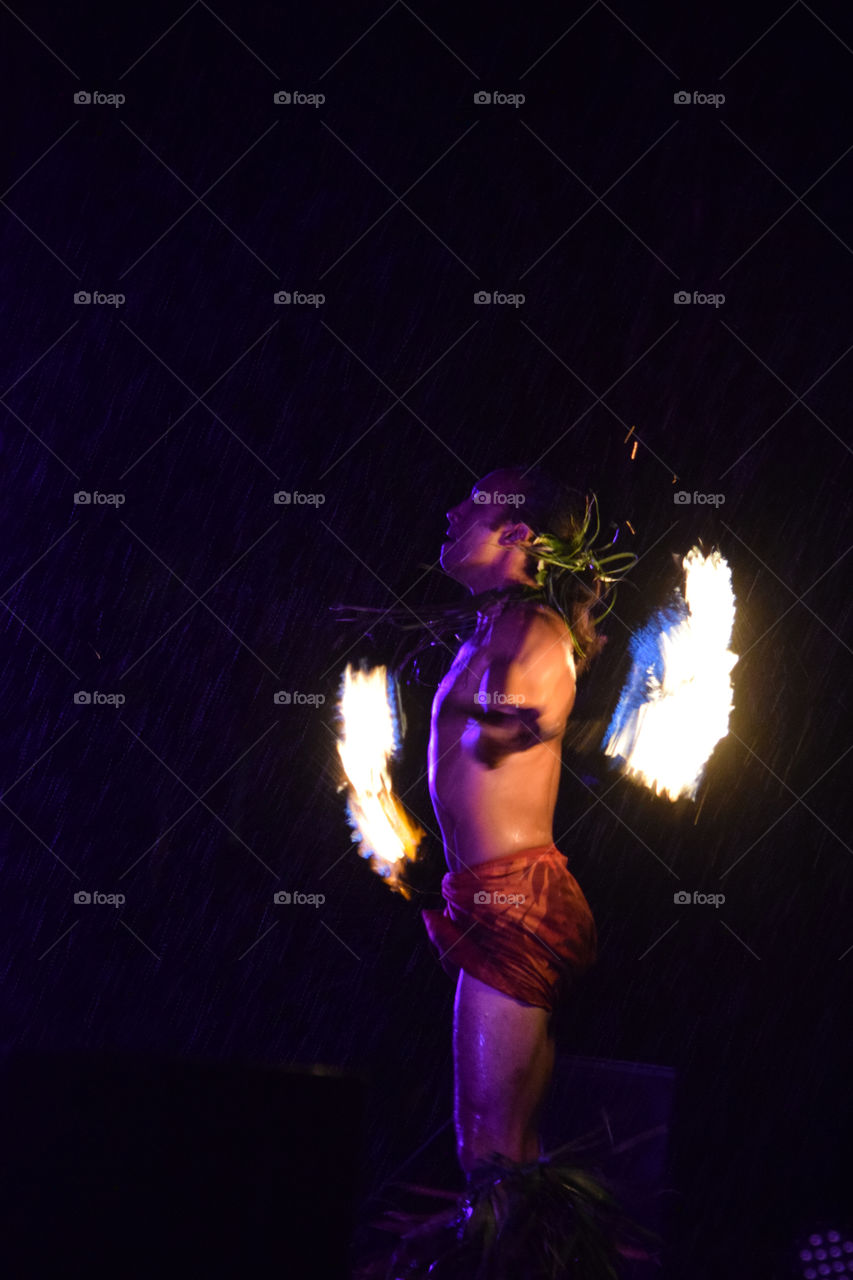 Fire dancing in the rain