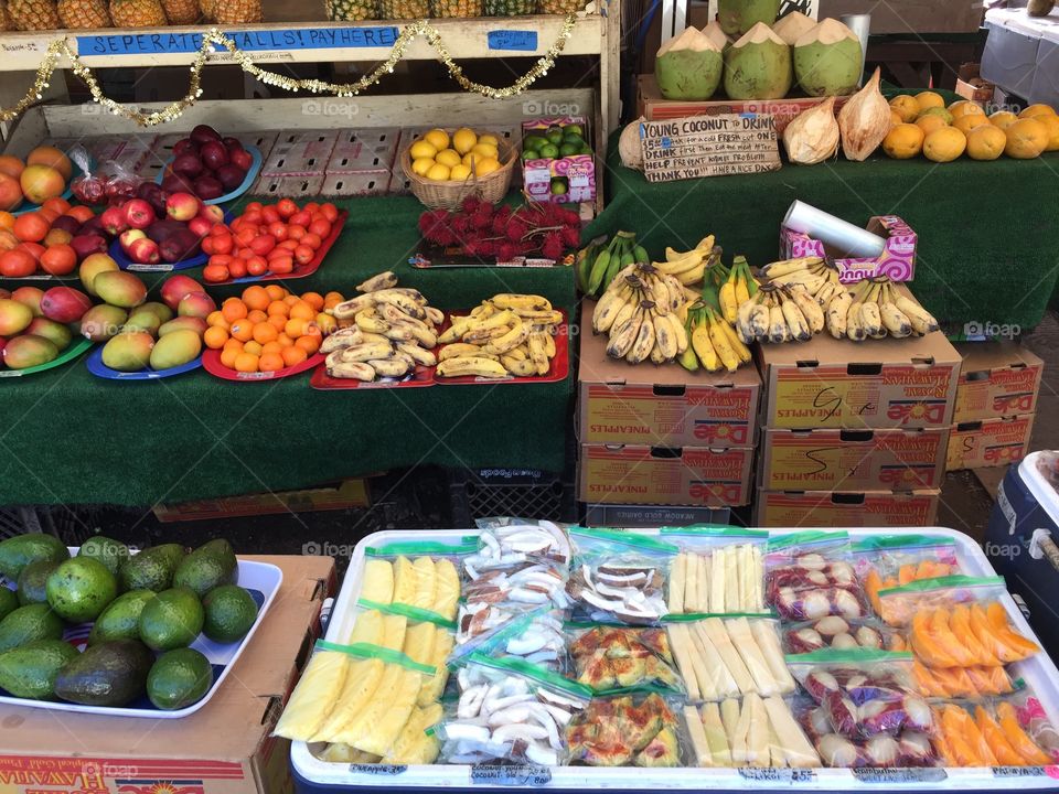 Assorted fruits at a fruit stand in Hawaii 