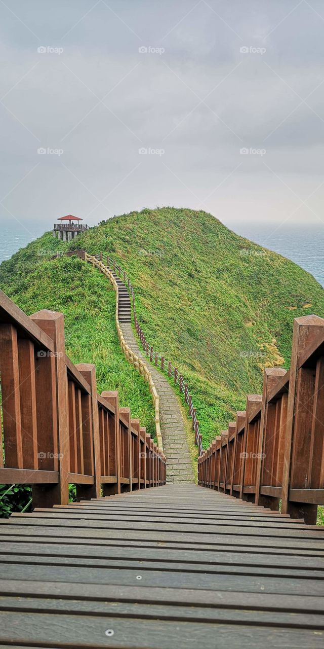 when the sky meets the hill and the sea