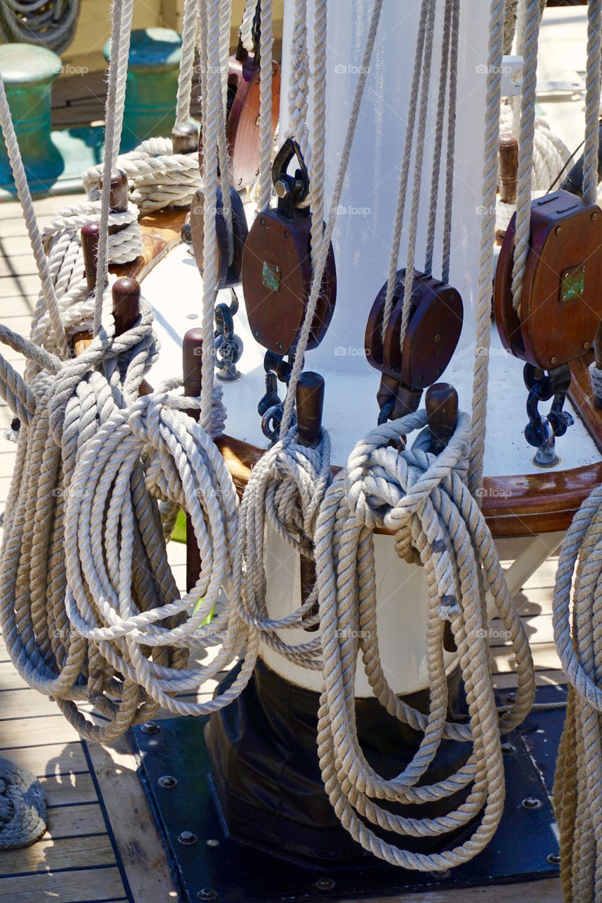 Ropes, wooden block and tackle on a two master schooner