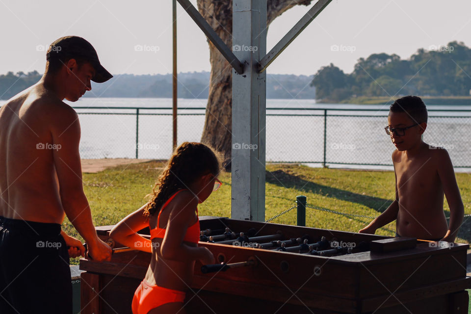 my kids favorite moment is to play with their father in foosball in the summer