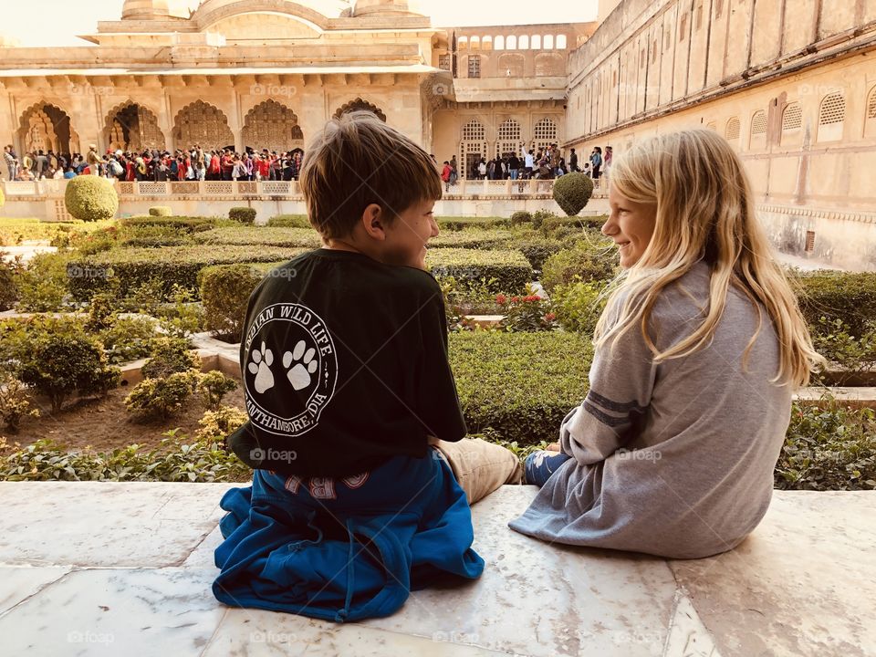 Family laughing together at the Amber Fort in Jaipur India 