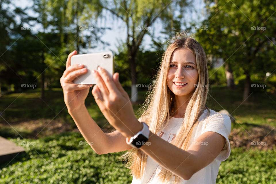 Woman making selfie
