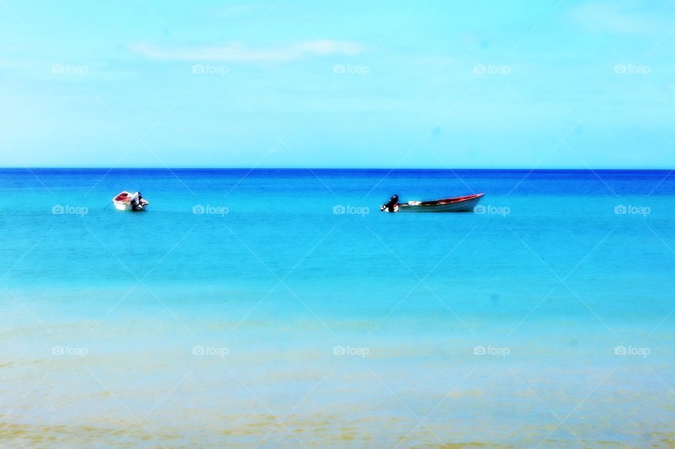 Two boats in the beach
