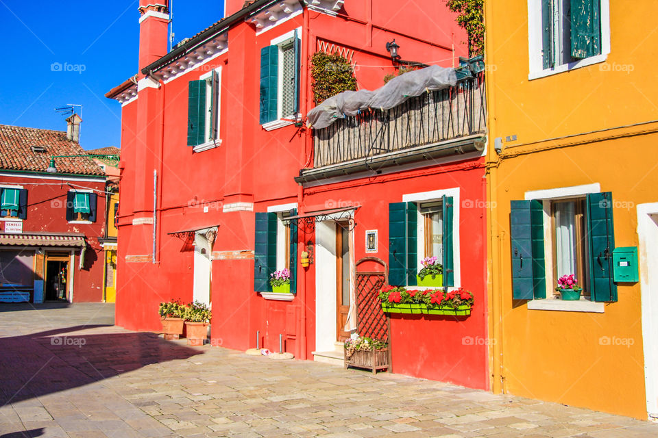 Different grades of orange color houses from Venice city.