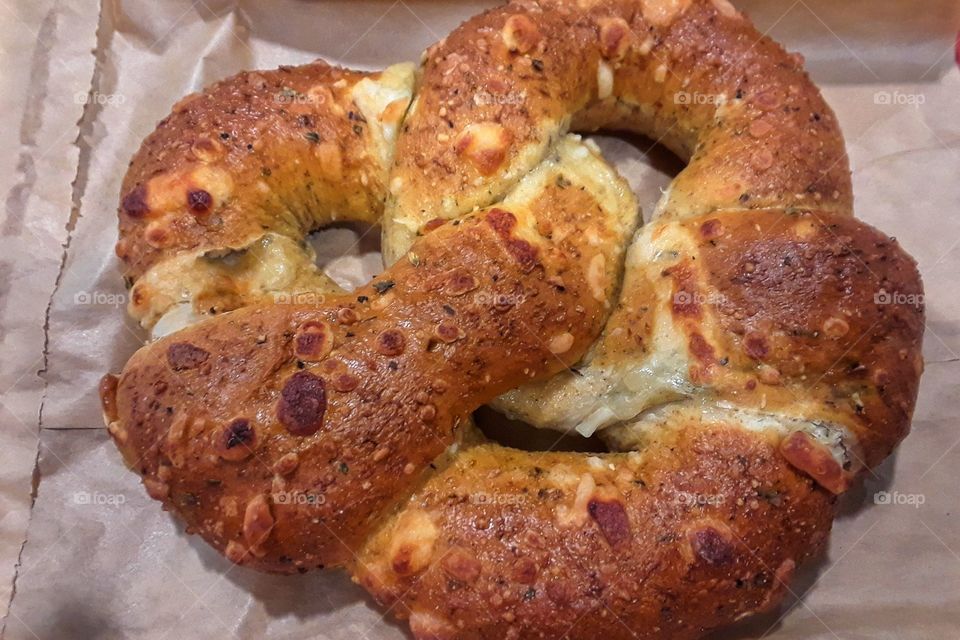 This photo is of a spinach and feta cheese stuffed pretzel from Barnes and Noble cafe.