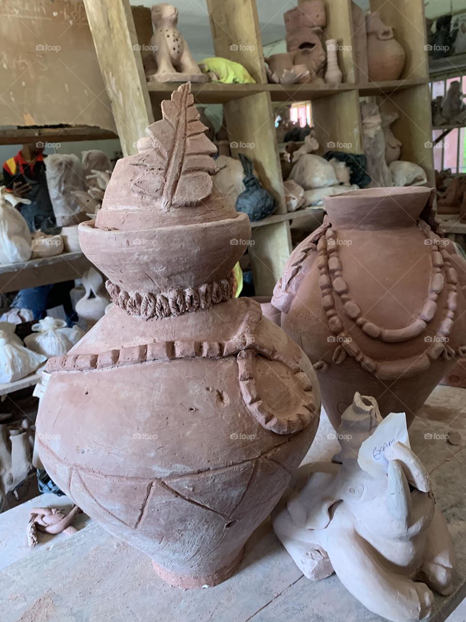 Ceramics representing Nigeria ceremonial pot, I use manual method, coiling and slab method to achieve this, I also use Nigeria ULI design to bring out the beauty of this art piece 🙏