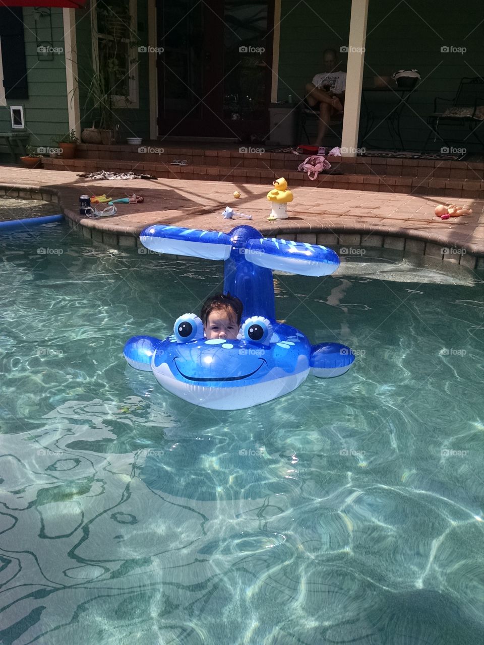 baby floating. she's most content in the water